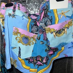 - [ ] Versace women shorts multiple color size 28 Authentic worn once